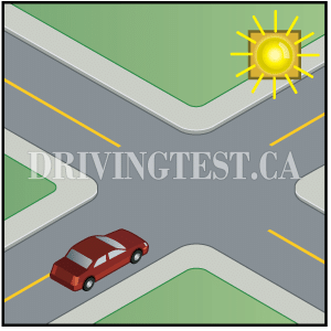 nova-scotia car - What is indicated by a flashing yellow beacon over an intersection?