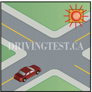 What is indicated by a flashing red light at an intersection? - What is indicated by a flashing red light at an intersection?